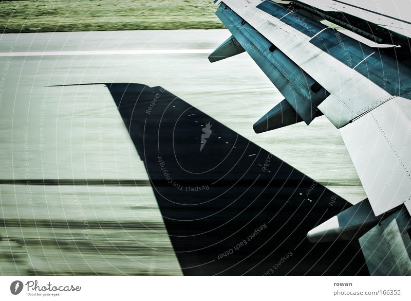 landing Colour photo Subdued colour Day Aviation Airplane Airport Runway Airplane landing Airplane takeoff In the plane View from the airplane Speed Wing Brakes
