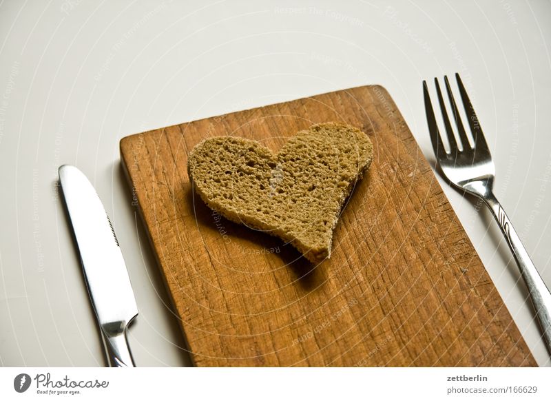 heart Food Bread Nutrition Breakfast Cutlery Knives Fork Happy Harmonious Valentine's Day Heart Love Romance Wooden board Chopping board Colour photo