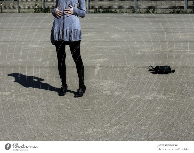 mealtime Colour photo Subdued colour Copy Space right Day Shadow Contrast Front view Young woman Youth (Young adults) Stomach Legs 18 - 30 years Adults