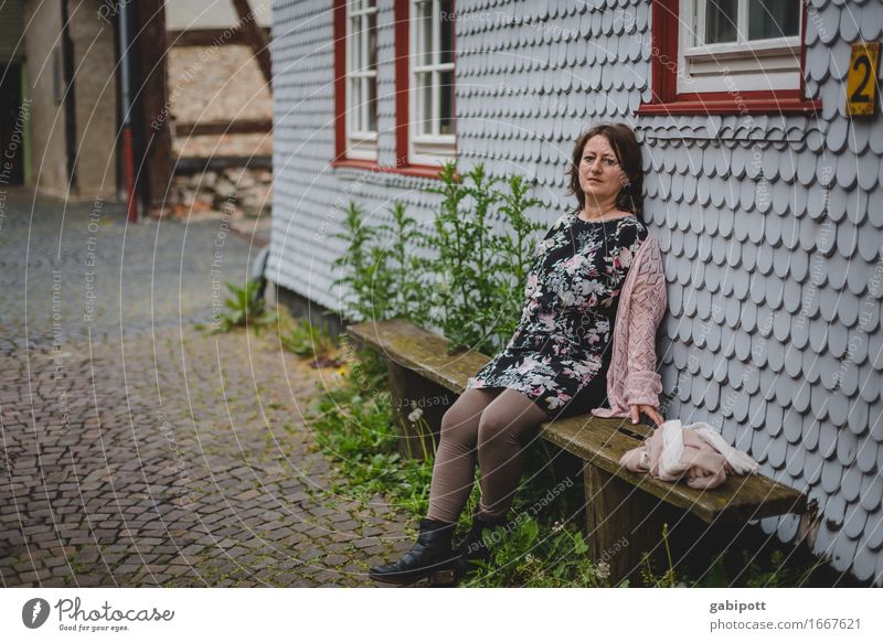 Rest for a while. AST 9. Human being Feminine Woman Adults Life Hesse Europe Germany Village Small Town Old town House (Residential Structure) Facade Window