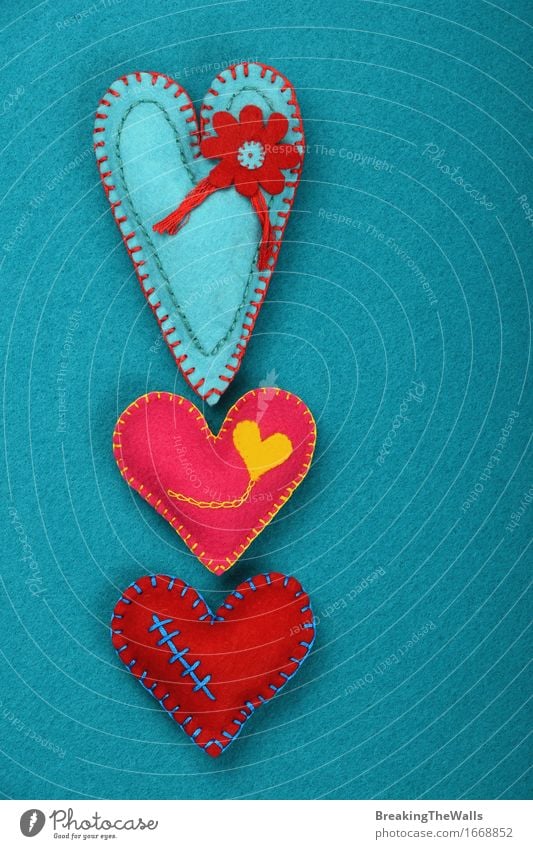 Three stitched toy hearts, pink, red and teal on blue felt Leisure and hobbies Handcrafts Valentine's Day Mother's Day Art Work of art Toys Heart Love Together