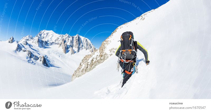 Mountaineer climbs a snowy peak. Chamonix, France, Europe. Vacation & Travel Trip Adventure Expedition Winter Snow Sports Climbing Mountaineering Human being