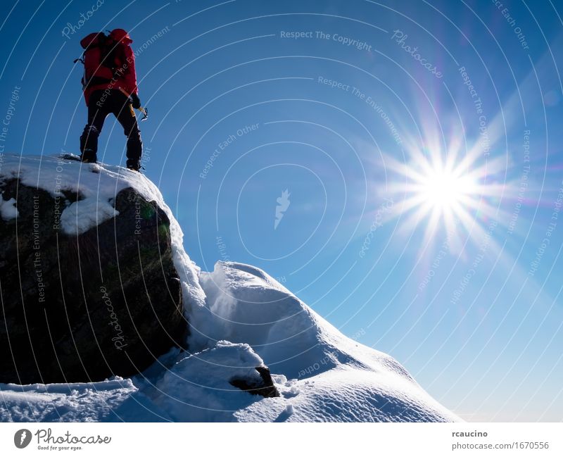 Mountaineer celebrates the conquest of the summit. Joy Vacation & Travel Adventure Freedom Expedition Sun Winter Sports Climbing Mountaineering Success
