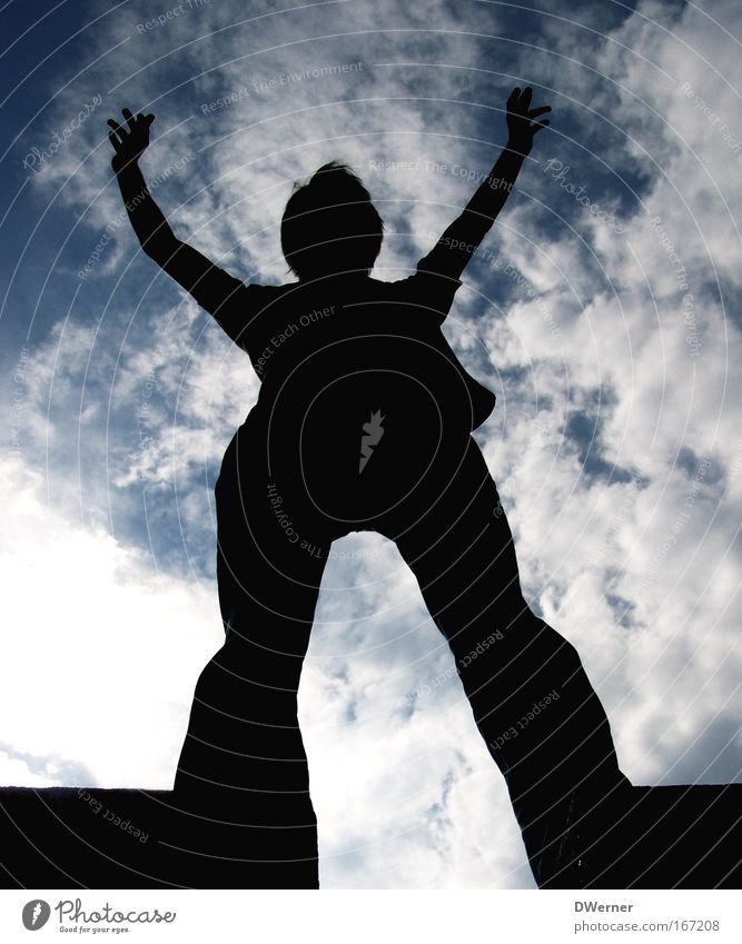 touch the sky Human being Masculine Man Adults 1 18 - 30 years Youth (Young adults) Stage Sky Clouds Summer Wall (barrier) Wall (building) T-shirt Breathe