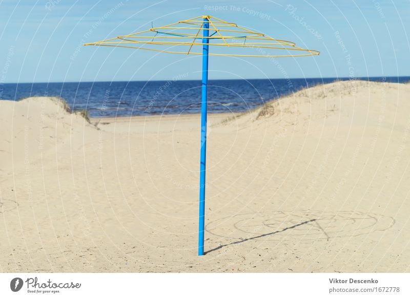 Blue frame with yellow top iron umbrella in the dunes Relaxation Vacation & Travel Tourism Summer Sun Beach Ocean Island Nature Landscape Sand Sky Weather