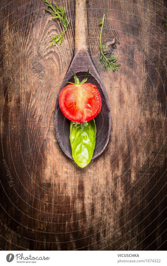 Half of tomato and basil leaf in cooking spoon Food Vegetable Herbs and spices Nutrition Italian Food Spoon Style Design Healthy Eating Life Table Kitchen