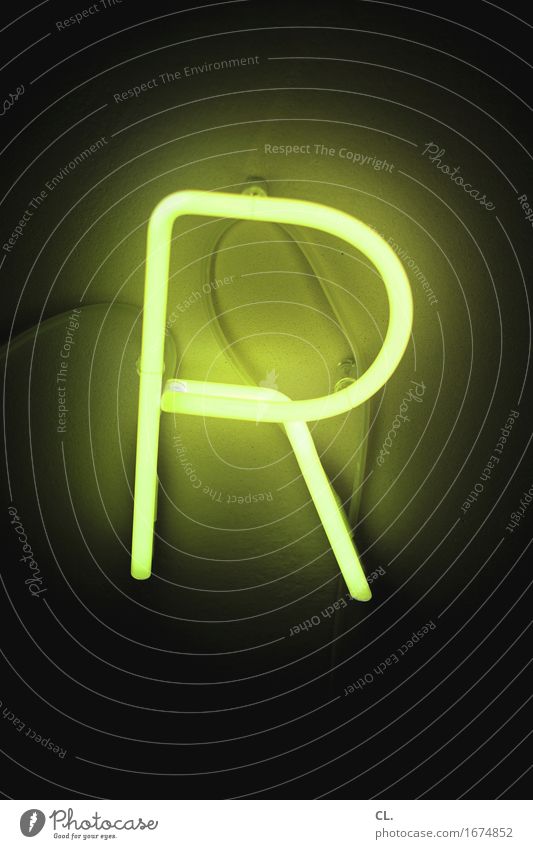 R Sign Characters Dark Yellow Green Neon sign Fluorescent Lights Lighting Lighting element Colour photo Interior shot Deserted Copy Space top Copy Space bottom