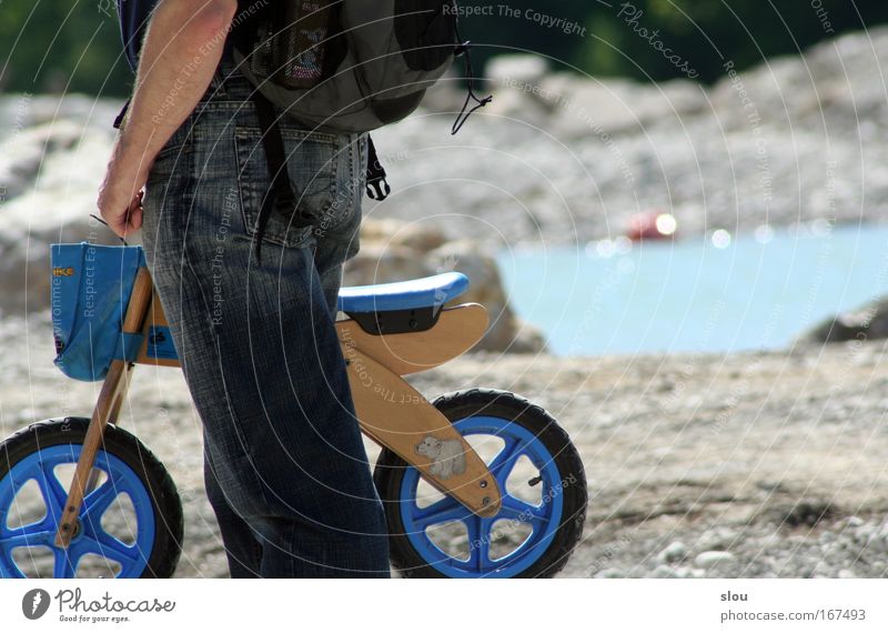 Isar rider Colour photo Exterior shot Day Sunlight Central perspective Human being Masculine Child Infancy Arm Bottom Legs 1 1 - 3 years Toddler Nature