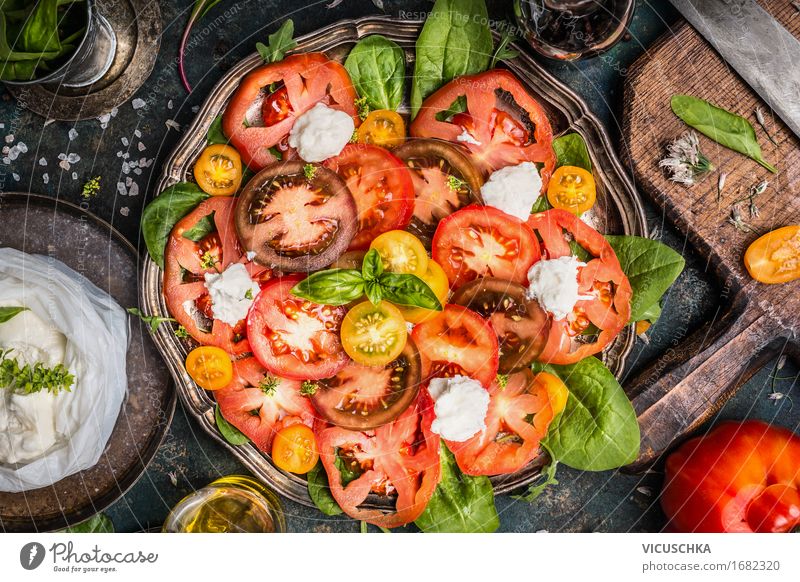 Classic caprese salad with tomatoes and mozzarella Food Cheese Vegetable Herbs and spices Cooking oil Nutrition Lunch Organic produce Diet Italian Food Crockery