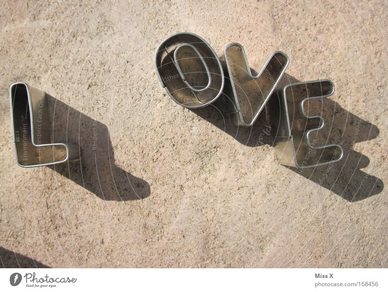L OVEr Sign Characters Love Spring fever Infinity Metalware Tin Cookie baking tin Sand toys Subdued colour Close-up Deserted Baking cookie cutter Shadow