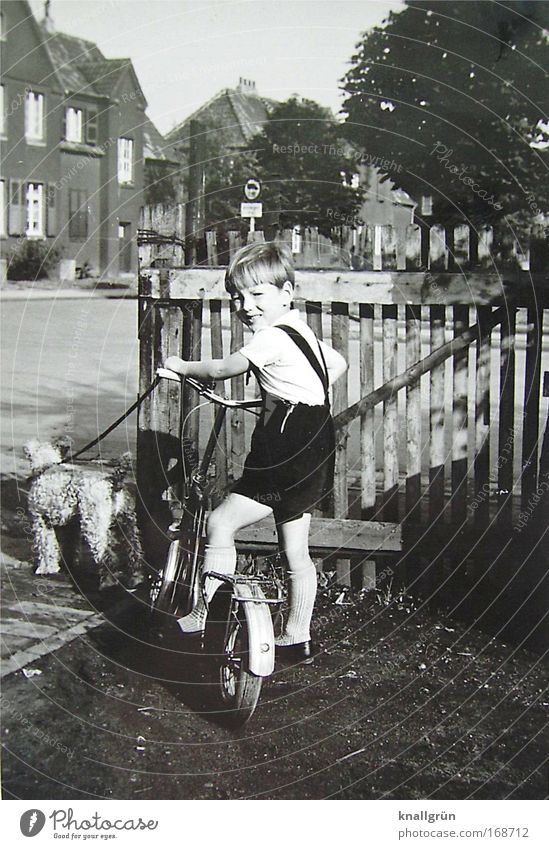 childhood Black & white photo Exterior shot Day Looking into the camera Playing scoot Scooter Human being Masculine Child Boy (child) Infancy 1 3 - 8 years