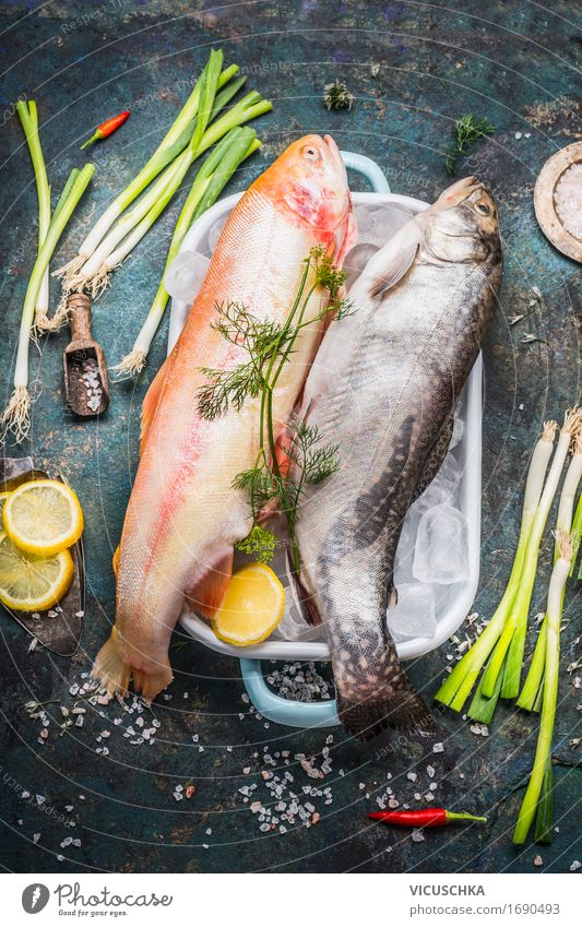 Trout with ice cubes and fresh ingredients for cooking Food Fish Vegetable Herbs and spices Nutrition Lunch Dinner Organic produce Diet Crockery Style Design