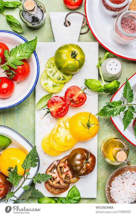 Colourful tomatoes cut into slices with cooking ingredients Food Vegetable Lettuce Salad Herbs and spices Cooking oil Nutrition Lunch Dinner Buffet Brunch