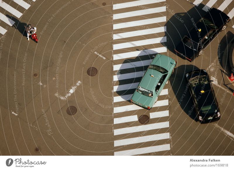 Alone against the Mafia Colour photo Exterior shot Day Shadow Bird's-eye view Means of transport Traffic infrastructure Motoring Street Crossroads Taxi Scooter