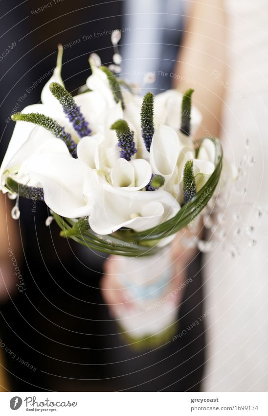 Bride holding wedding bouquet of white flowers. Romantic details Luxury Elegant Happy Beautiful Decoration Feasts & Celebrations Wedding Woman Adults Hand