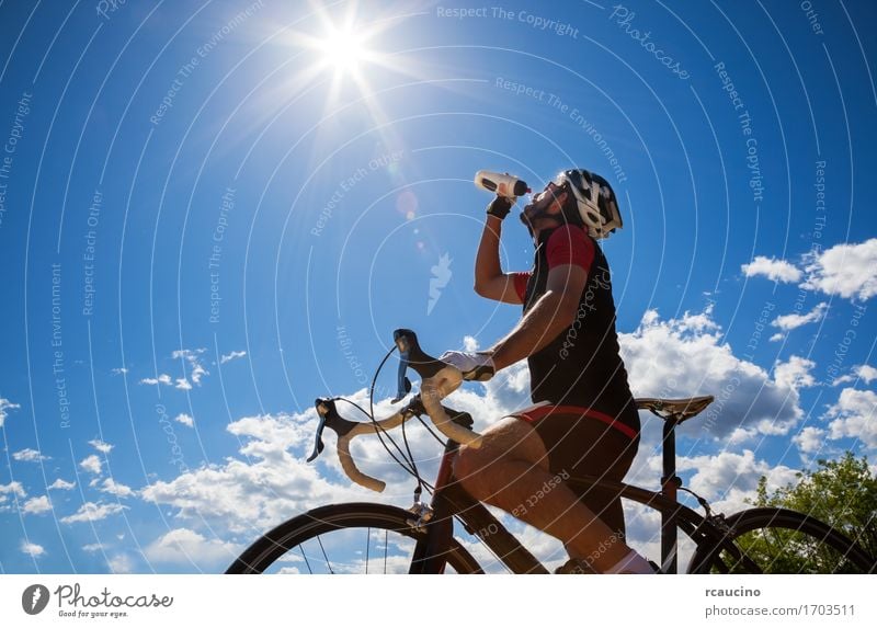 Cyclist resting and drinking isotonic drink Drinking Bottle Lifestyle Joy Relaxation Leisure and hobbies Vacation & Travel Adventure Freedom Summer Sun Sports