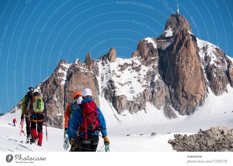 Aiguille du Midi and mountaineers. Mont Blanc Chamonix, France Vacation & Travel Tourism Adventure Expedition Winter Snow Mountain Hiking Sports Climbing