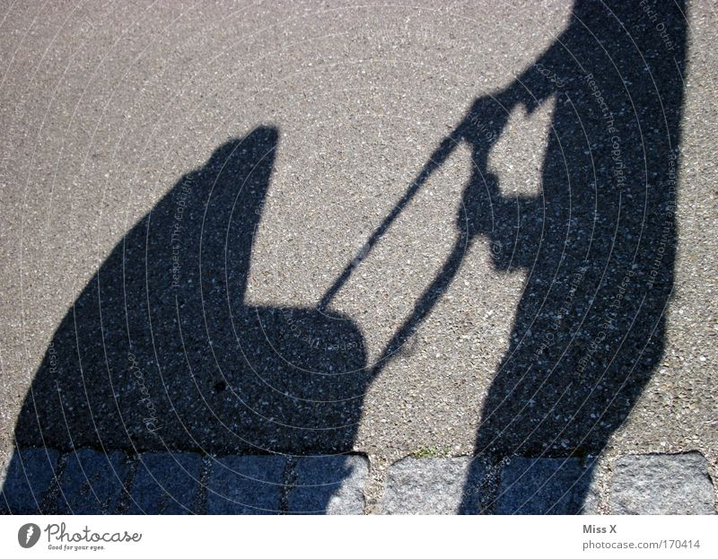 grasp nicely Exterior shot Day Shadow Silhouette Sunlight Parents Adults Mother Father Infancy Life 1 Human being Pedestrian Street Lanes & trails Going Happy