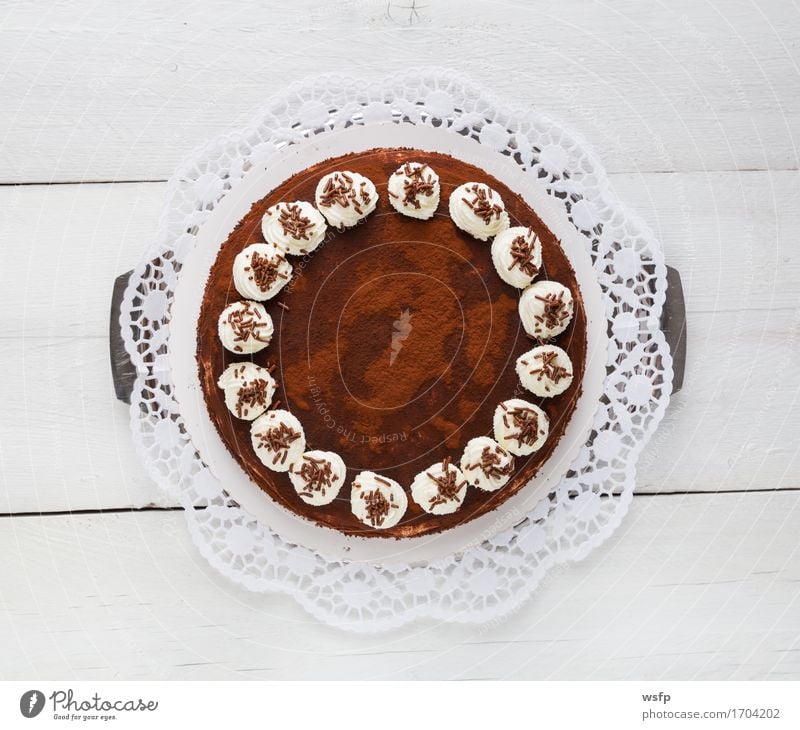 Tiramisu cake on white wood rustic Cake Dessert Chocolate Wood White Tiramisu Cake tiramisu Gateau foam pastries Cream cake top Baked goods Baking sponge cake