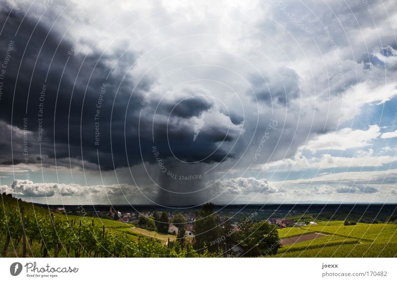 downpour Colour photo Exterior shot Panorama (View) Landscape Elements Air Sky Storm clouds Wind Rain Thunder and lightning Village Town Aggression Blue Gray
