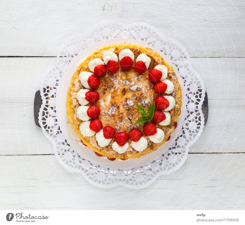 Baisertorte with strawberry yoghurt on white wood Yoghurt Cake Dessert Wood White meringue cake Strawberry Gateau foam pastries Cream cake top Baked goods