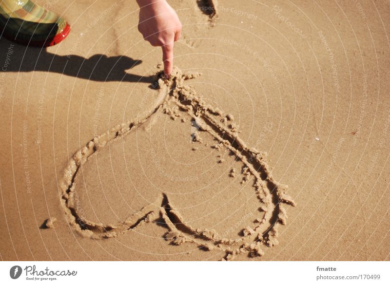 Heart on the beach Colour photo Exterior shot Shadow Downward Vacation & Travel Summer vacation Beach Ocean Sign Characters Draw Natural Brown Joy Happy