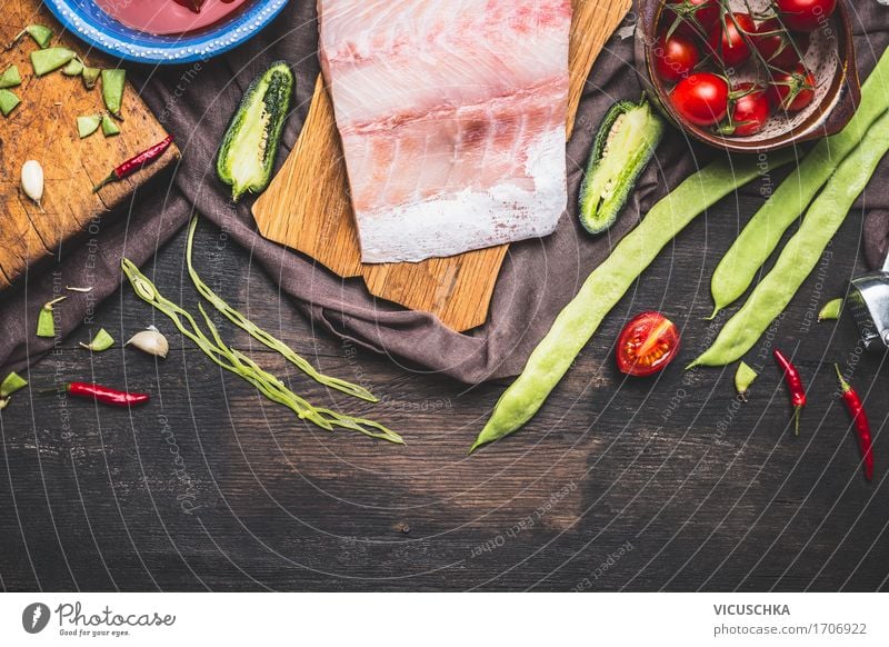 Preparation of fish fillets with green beans, tomatoes and ingredients Food Fish Vegetable Nutrition Lunch Dinner Organic produce Vegetarian diet Diet Crockery