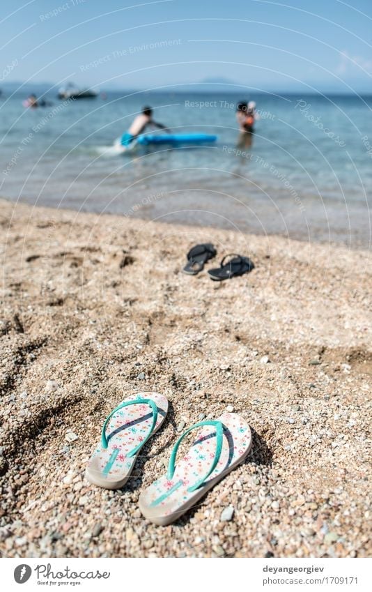 Slippers in the sand on the beach Relaxation Leisure and hobbies Vacation & Travel Tourism Summer Beach Ocean Woman Adults Nature Sand Sky Coast Footwear Blue