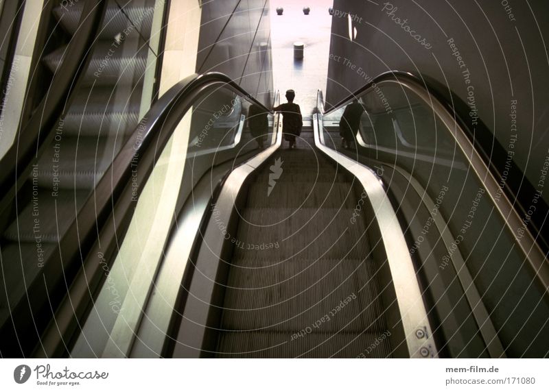 down Escalator Downward Descent Crisis Economic crisis Impersonal Cold impersonally Steel Line Wide angle Loneliness Woman Stairs fahrstul Automatic sluggish