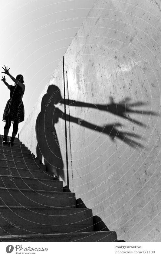 The wanderer and his shadow Hand Black & white photo Woman Dress Stairs Light Shadow Wall (building) outdoor shot Sun Warmth Playing