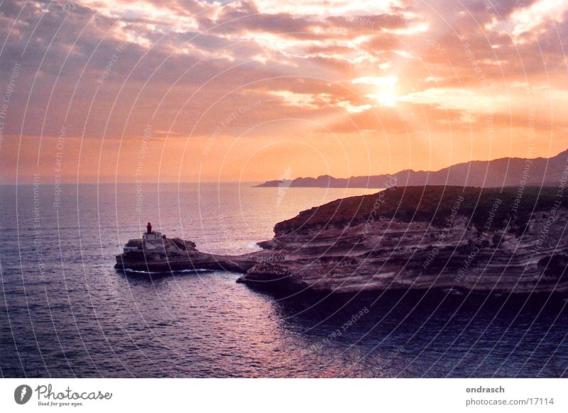 Bonifacio Showdown Sunset Clouds Lighthouse Ocean Night South Vacation & Travel Romance Dusk Sky Bay Coast Water Evening corsica France