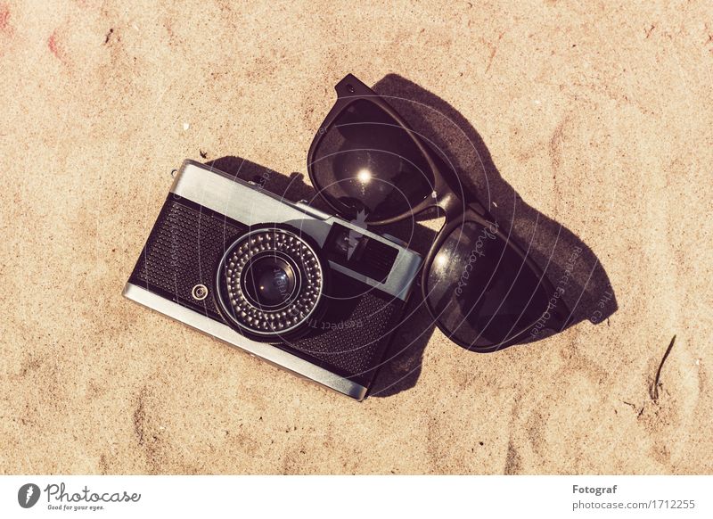 Camera and sunglasses on the beach on vacation Lifestyle Elegant Vacation & Travel Tourism Trip Adventure Safari Expedition Camping Summer Summer vacation Sun