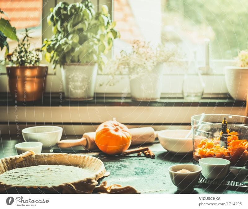 Kitchen scene with the preparation of the pumpkin cake Food Vegetable Cake Dessert Candy Nutrition Banquet Organic produce Vegetarian diet Crockery Lifestyle