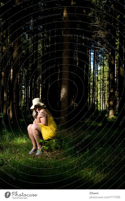 alone in the dark Colour photo Artificial light Looking into the camera Feminine Young woman Youth (Young adults) 18 - 30 years Adults Nature Forest Fashion Hat