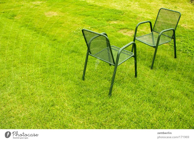 Two chairs Green Lawn Grass surface Meadow Park Chair Garden chair Outdoor furniture Meeting Date Comparison Communicate Dialog partner Opposite Places Seating