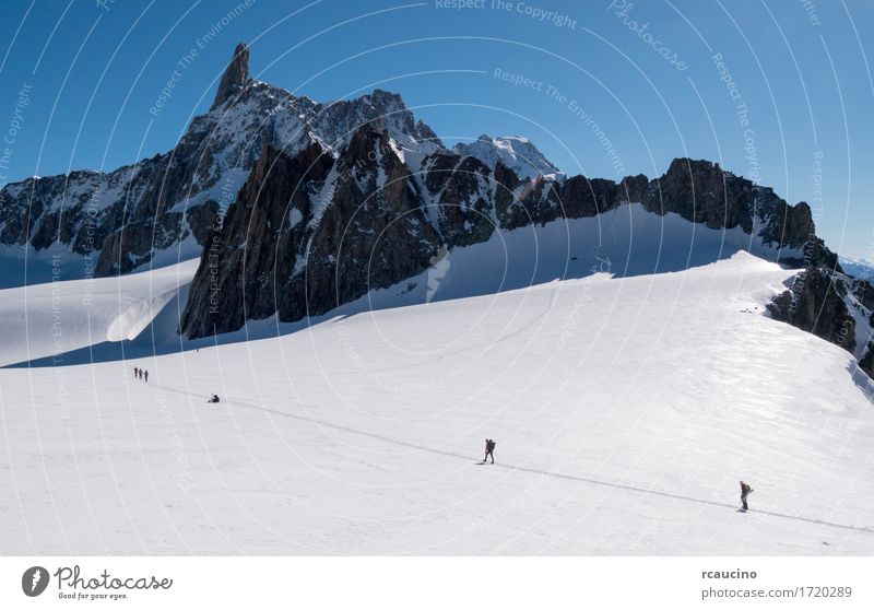 Mountaineers the Dent du Geant peak, Mont Blanc Vacation & Travel Tourism Adventure Expedition Winter Snow Hiking Sports Climbing Mountaineering Success Group