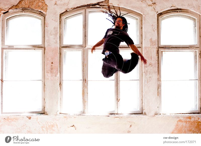 Jumping Black Colour photo Multicoloured Interior shot Copy Space left Copy Space right Copy Space bottom Day Light Central perspective Full-length Forward