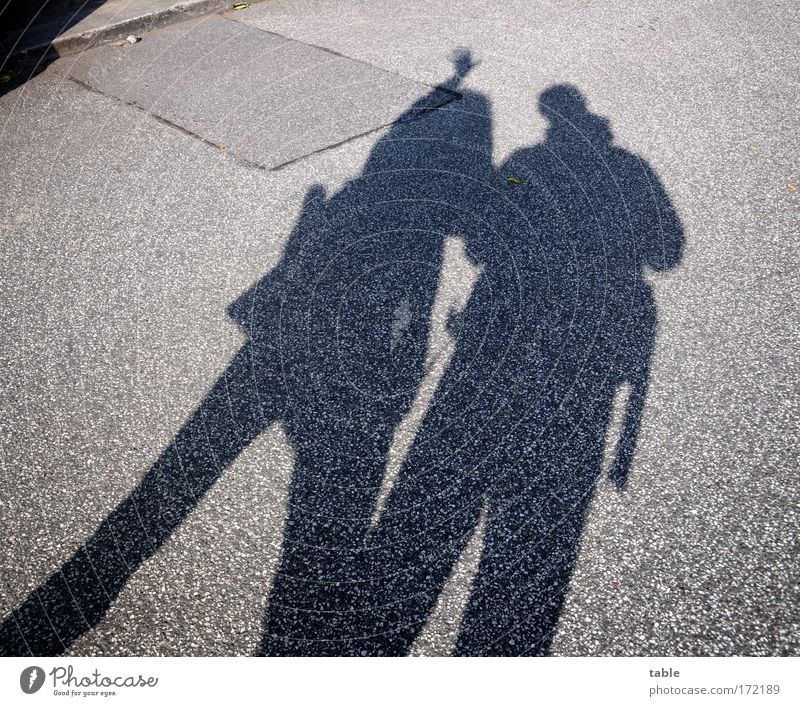 tourists Colour photo Subdued colour Shadow Full-length Lifestyle Joy Vacation & Travel Trip Human being Woman Adults Man Partner 2 Beautiful weather Pedestrian