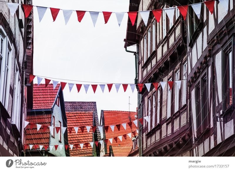 AST 9 | Today we celebrate! Half-timbered houses decorated with white red flags Village Small Town Downtown Old town Pedestrian precinct
