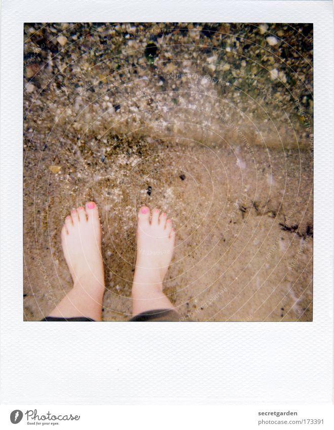 [KI09.1] Getting your feet wet. Colour photo Subdued colour Exterior shot Close-up Polaroid Copy Space top Copy Space middle Bird's-eye view Downward Elegant
