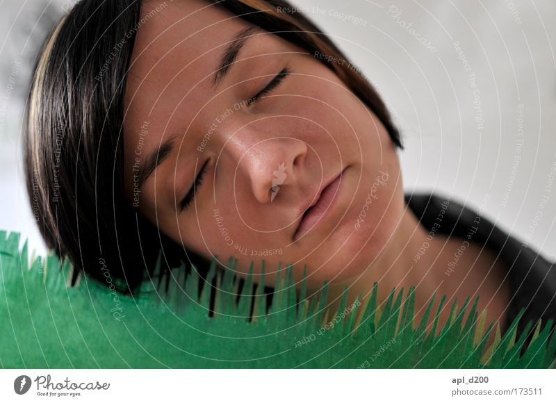 Too much grass Colour photo Interior shot Neutral Background Day Shallow depth of field Portrait photograph Upper body Closed eyes Human being Feminine