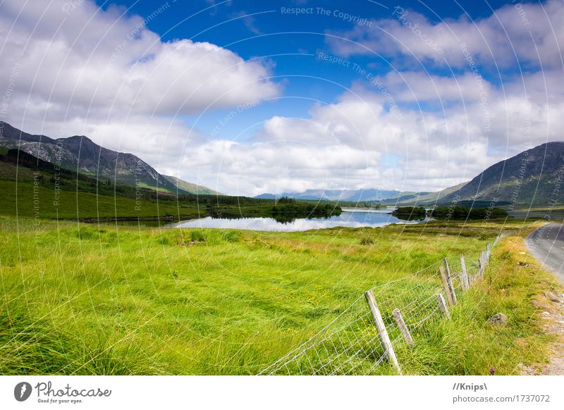 At the roadside Nature Landscape Water Sky Clouds Beautiful weather Mountain Lake Infinity Break Ireland Colour photo Exterior shot Day Reflection
