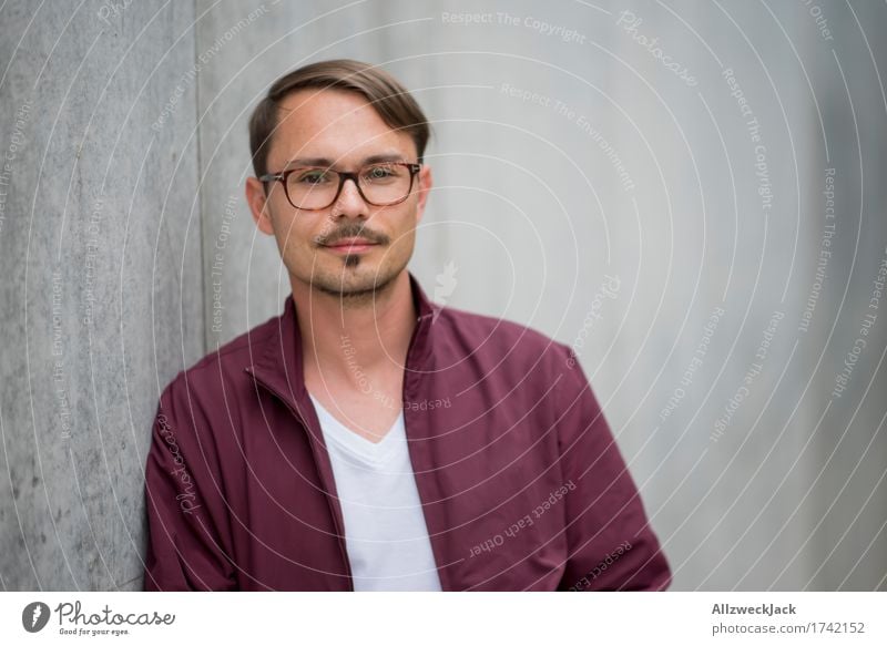 Portrait 1 Masculine Young man Youth (Young adults) Man Adults Human being 18 - 30 years 30 - 45 years Jacket Eyeglasses Brunette Part Moustache Friendliness