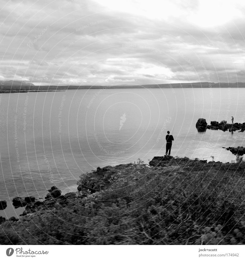 Icelandic fisherman Leisure and hobbies Fishing (Angle) Human being 1 Nature Landscape Sky Clouds Bad weather Lakeside Relaxation Stand Emotions Serene Patient