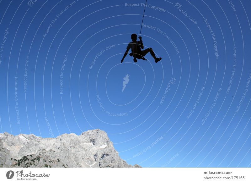 Spider against blue 1 Colour photo Exterior shot Day Silhouette Climbing Adventure Mountain Sports Mountaineering Human being Landscape Cloudless sky Rock Alps