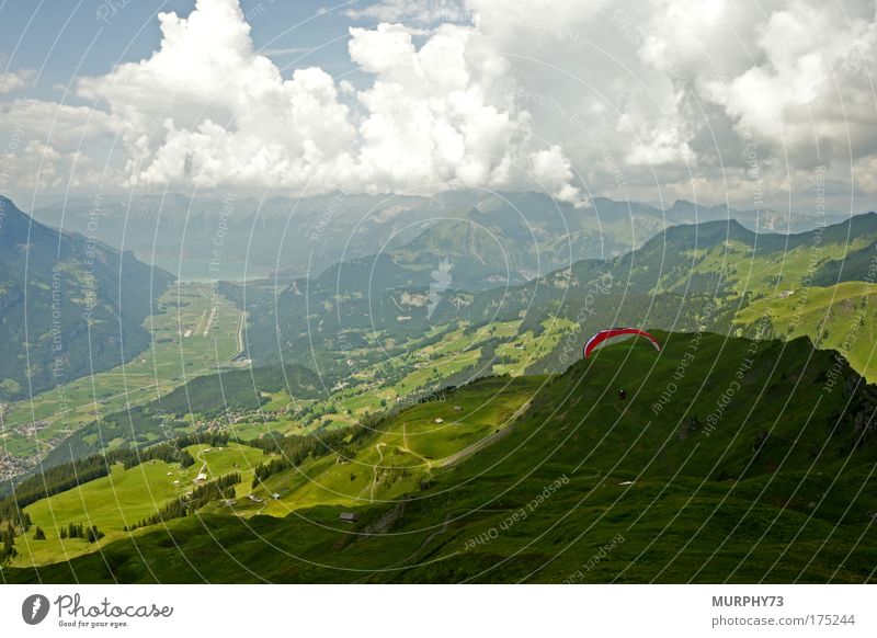 Paragliding jump in the Bernese Oberland Colour photo Exterior shot Day Deep depth of field Bird's-eye view Wide angle Vacation & Travel Tourism Trip Freedom
