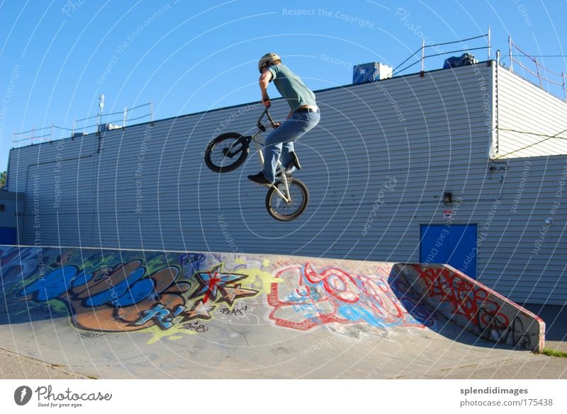 BMX jump Colour photo Exterior shot Day Worm's-eye view Wide angle Sports Cycling Bicycle BMX bike Ramp Skate park Young man Youth (Young adults) 18 - 30 years