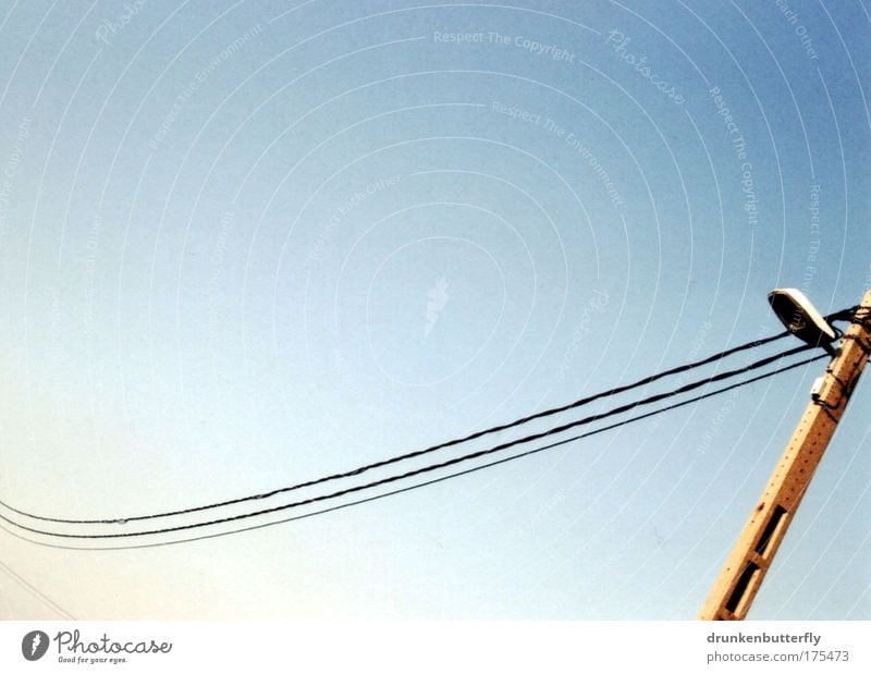 streamlines Colour photo Exterior shot Abstract Copy Space top Copy Space bottom Day Sunlight Cable Hang Electricity Lamp Street Transmission lines Sky Mast