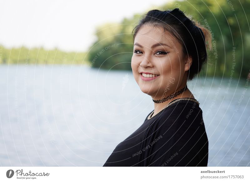 Asian Girl Feeling Happy At The Lake Stock Photo, Picture and