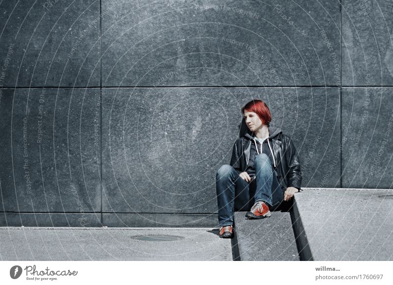 Young casual woman in leather jacket and jeans takes a little time out sitting on steps Youth (Young adults) Young woman Sit stagger Leather Red-haired Observe